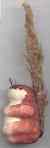 Squirrel with straw tail