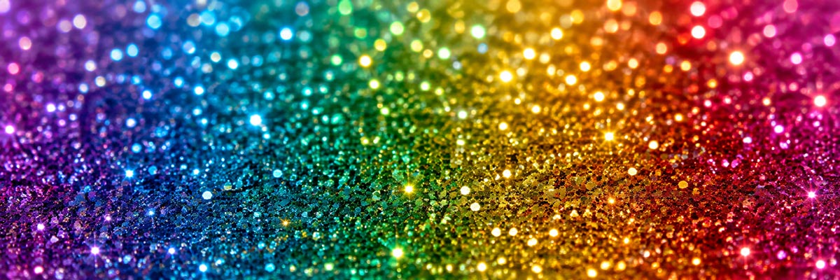 Assorted craft glitter in multiple colors, including fine and extra fine glitter, displayed in jars, tubes and assorted packs for craft projects.