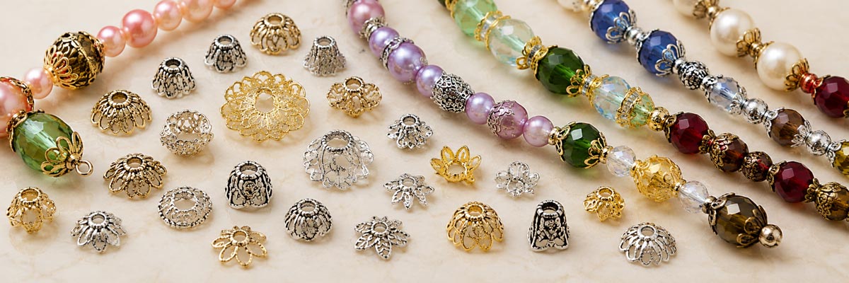Assorted decorative metal bead caps, beadcaps and bead cones in a variety of sizes, styles and finishes for jewelry making and beading projects.