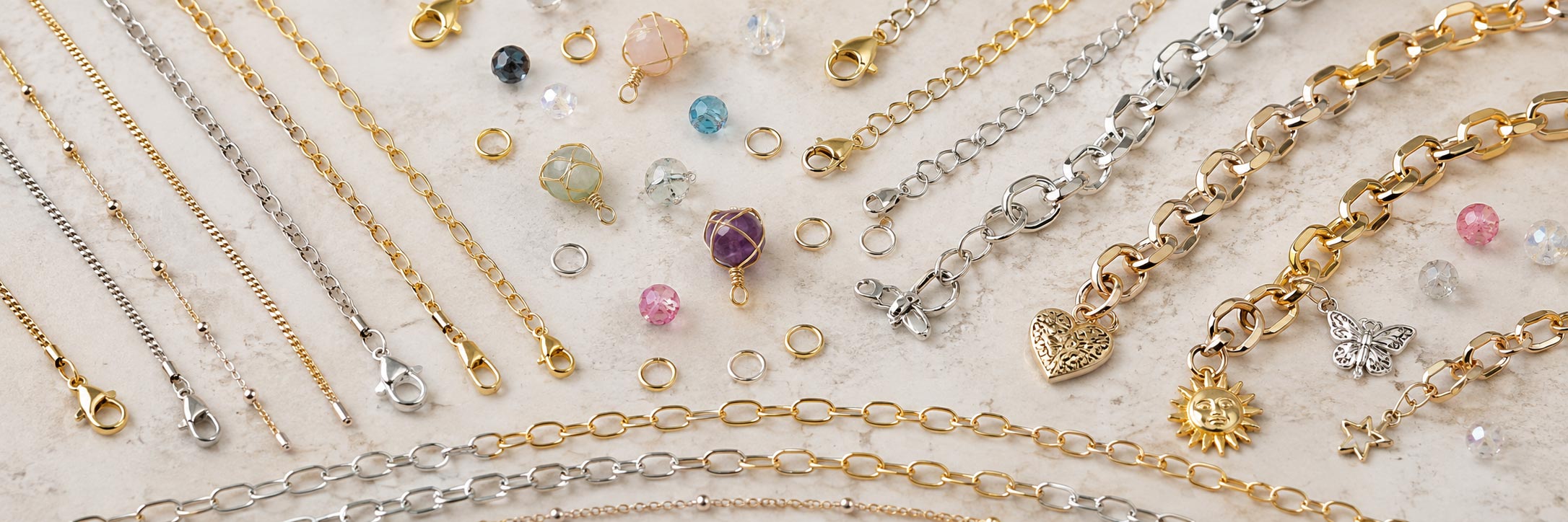 Assorted jewelry chains including necklace chains, bracelet chains, decorative chain, charm bracelet blanks and chain extenders for jewelry making and craft supplies