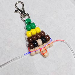 Photo of the nose cord pattern for the beaded elf keychain free pattern.