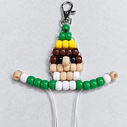 Free pony bead Christmas buddy elf pattern showing the finished beaded arms before continuing to the elf's body and legs.